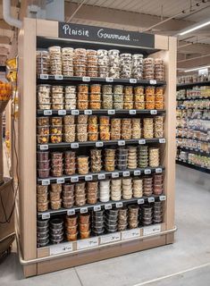 a display case in a grocery store filled with lots of food