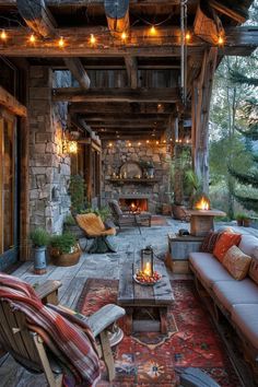 an outdoor living area with furniture and lights