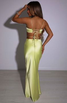 Going out? Enter Valeria. your new favourite maxi skirt made from luxury stretch satin with a bias cut which drapes beautifully around your curves. The design is finished with a slightly dipped waist.  Colour: Lime.  Premium stretch satin.  Fully lined in satin.  Bias cut which hugs the figure.  Slight dipped waist.  Maxi length Model is a Size XS & is wearing an XS. She is 160cm Tall and wears a size C Breast Cup. Long Sleeve Homecoming Dresses, Split Long Dress, Homecoming Dresses Long, Maxi Dress Sale, Sparkle Dress, Lace Evening Dresses, Tulle Prom Dress, Waist Strap, Dresses By Length