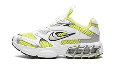 The Women’s Nike Zoom Air Fire “Lemon Twist” is a women’s version of the retro-inspired lifestyle shoe with an early 2000s vibe.  Inspired by running shoes from that era, the Women’s Nike Zoom Air Fire is designed in a hard-to-miss way with white leather overlays placed on top of a Lemon Twist mesh base.  A silver Swoosh with black trim appears on either side of the shoe.  A neon green Swoosh is embroidered on the heel.  Underfoot, Nike supplies the model with its signature visible Zoom Air cush Nike Vapormax Women, Nike Zoom Air Fire, Fire Shoes, Nike Zoom Air, 2000s Vibe, Nike Vapor Max, Black Huarache, Lemon Twist, Air Fire