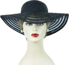 Vintage black floppy brim hat. Deep rounded crown is a solid faux straw while the brim is crafted in panels of sheer straw much like horsehair. Hatband is a wide black grosgrain ribbon. Original owner has pinned a vintage pink silk and velvet corsage to the back left side. Interior is finished with a black fabric ribbon.Label has been removed.Excellent condition with no issues.Inner circumference is 22 inches. Measuring on the outside, side to side is approximately 21 inches. Brim extends 4 1/2 inches all around. Crown has a rise of 3 1/2 inches.Alley Cats Vintage is a Member of the Vintage Fashion Guild. Elegant Lined Brimmed Sun Hat, Elegant Brimmed Lined Sun Hat, Formal Black Adjustable Sun Hat, Elegant Black Cloche Hat For Beach, Elegant Black Cloche Hat For The Beach, Classic Brimmed Straw Hat For Evening, Black Cloche Hat For Kentucky Derby And Beach, Black Formal Sun Hat With Short Brim, Black Wide Brim Cloche Hat For Summer