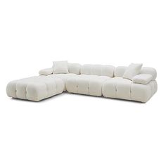 Calliope Cream Vegan Shearling 4-Piece Modular Sectional by TOV FurnitureIntroducing the Calliope Cream Vegan Shearling Modular Collection, featuring ultra-soft vegan shearling that brings unmatched comfort. The deep hand-tufted structure creates the cushioning curves reminiscent of a Brioche bun, enveloping you in a pillowy silhouette. With a modular layout allowing for endless configuration possibilities, the movable cushions add versatility, enabling you to customize your space easily.Features:Handmade by skilled craftsmenUltra-soft vegan shearling upholsteryPillowy silhouette with deep hand-tufted designModular design allows for endless configuration possibilities - create your dream piece for your spaceRemovable arms can also be used as a backrest or headrestFabric swatch available up Brioche Bun, Grey Sectional Sofa, Sofa Bed Sleeper, Velvet Sectional, Tov Furniture, Sectional Sofa With Chaise, Sectional Sofas Living Room, Sofa Manufacturers, Grey Sectional