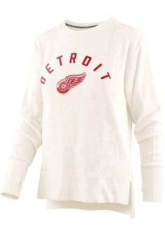 Make your way to the big game in this Detroit Red WingsWomens Ivory Cuddle Crew Sweatshirt! This Red Wings Long Sleeve Sweatshirt features a screen print team name and logo on center chest. Stay warm and comfortable with this Womens Detroit Red Wings Crew Sweatshirt. hi-lo shaping, screen print team graphic, extra soft feel, 80% COTTON / 20% POLYESTER Team Name, Detroit Red Wings, Long Sleeve Sweatshirt, Red Wings, Big Game, Crew Sweatshirts, Team Spirit, Long Sleeve Sweatshirts, Screen Print