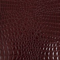 Get red-y to rock with this Brisbane Burgundy Faux Crocodile Patent Leather! In deep wine red, this vinyl features an embossed and shaded crocodile skin pattern, which lends a fascinatingly bumpy texture to an otherwise slick surface. With an off-white backing and quite stiff in drape, craft boxy jackets, fashionable footwear, and excellent accessories like handbags! Totally opaque, a lining isn’t necessary but may be desirable for comfort in wear and a polished finish.   Note: This product pass Journal Printouts, Fabric Texture Pattern, Minimalist Wardrobe Essentials, Brown Autumn, Night Mode, Snakeskin Pattern, Skin Pattern, Mood Fabrics, Fabric Textures