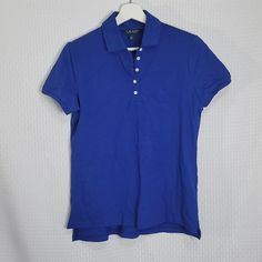 Lauren Ralph Lauren Polo Shirt Size Medium New With Tags Approximate Measurements Laying Flat Underarm To Underarm 18 Inches From Shoulder Seam To Bottom Front Hem 23 Inches Inv A5 Classic Blue T-shirt For Work, Classic Blue T-shirt For Casual Work, Blue Short Sleeve Polo Shirt For Workwear, Blue Short Sleeve Polo Shirt For Work, Linen Long Sleeve Top, White Embroidered Blouse, Paisley Print Shirt, Metallic Shorts, Striped Shirt Women