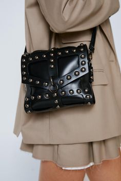 Punk Style Bag With Rivets For Daily Use, Punk Style Bags With Rivets For Everyday Use, Black Riveted Shoulder Bag, Black Rivets Shoulder Bag, Black Rectangular Shoulder Bag With Rivets, Riveted Shoulder Bag, Trendy Everyday Bags With Rivets, Edgy Leather Rectangular Shoulder Bag, Punk Style Shoulder Bag With Rivets