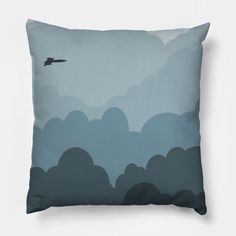 a blue pillow with an airplane flying in the sky