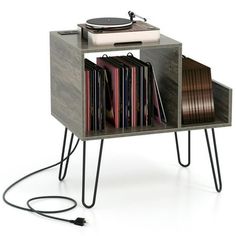 an old record player is turned into a side table