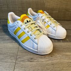 Adidas Superstar Triple Tongue ‘White Hazy Yellow Sand’ Brand New Shoes In Box. Never Worn. No Rips, Tears, Or Stains. Smoke Free Environment. Ships Carefully Packaged And Boxed Right Away. Let Us Know If You Have Any Questions! Gz7415 If You’re Interested In Multiple Pairs From Our Closet We Offer Bundle Deals So Feel Free To Look Around, Like, And Bundle! Adidas Yellow Sneakers For Spring, Adidas Yellow Sneakers With Laces, Yellow Adidas Sneakers With Laces, Yellow Adidas Sneakers With Round Toe, Yellow Adidas Sneakers, Pink Gazelles, Light Pink Adidas, Adidas Rivalry Low, Nmd Sneakers