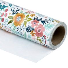 a roll of white paper with colorful flowers on it