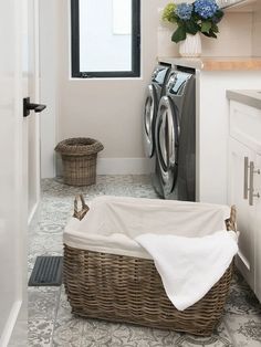 a laundry room with a washer and dryer