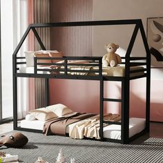 a black bunk bed with a teddy bear on top