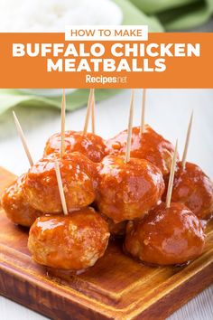 buffalo chicken meatballs with toothpicks on a cutting board