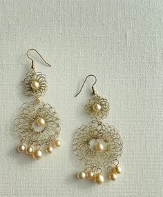 Aragon You will love this luxury crochet gold plated wire chandelier, and vintage pearls earrings.  They are stunning, unique, light weight and versatile. They can be the fun over-the-top accessory for a sporty look, or the perfect elegant touch to any special day or evening attire. This technique is perfect for bridal jewelry, providing the capability of designing any custom piece of jewelry for the bride and bride's maids. Contact me! EGld14 Wire Chandelier, Pearls Earrings, Over The, Aragon, Vintage Pearls, Resin Pendant, Bead Earrings, Evening Attire, Beaded Earrings