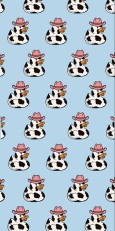 a cow with a cowboy hat on it's head is sitting in front of a blue background