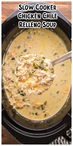 a black crock pot filled with chicken and cheese soup