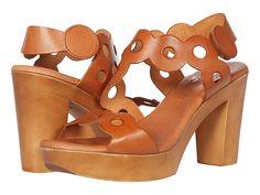 Eric Michael Sienna - Women's Shoes : Tan : The Eric Michael Sierra heeled sandal is perfect for a day out and about. The strappy leather upper boasts scalloped edges and large perforations while the hook-and-loop closure lends a secure fit. Leather lining and footbed. Tapered heel. Man-made outsole. Made in Spain. Measurements: Heel Height: 3 in Weight: 8 oz Platform Height: 1 in Product measurements were taken using size 38 (US Women's 7.5-8), width M (B). Please note that measurements may var Heeled Sandal, Scalloped Edges, Victorian Fashion, Product Reviews, Wedge Sandals, Women's Shoes, Sandals Heels, Heel Height, Leather Upper