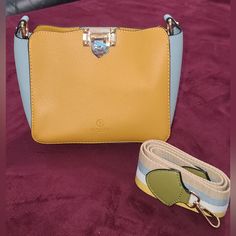 No Brand Leather Bag With A Strap Ht 6 1/4 In Width 7 1/4 In Depth 3 In Yellow Bucket Bag With Detachable Strap For Everyday Use, Yellow Top Handle Bag With Adjustable Strap, Chic Yellow Satchel With Mobile Phone Bag, Yellow Shoulder Bag For On-the-go, Chic Yellow Satchel With Phone Bag, Yellow Pouch Bag With Detachable Handle, Yellow Top Handle Satchel With Mobile Phone Bag, Yellow Top Handle Satchel With Adjustable Strap, Yellow Crossbody Satchel For Shopping