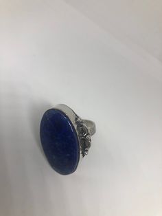 Large genuine blue Lapis Lazuli Vintage ring Low content silver not sterling. Size 8 Can be re sized. My jeweler charges $10-$20 All rings are shipped free in the US in a nice gift box. Check out our over a THOUSAND great reviews Engraving is $4 per letter and is not always perfect depending on the piece. It can take a few days if the jeweler is busy. This is payable to Paypal Judithsltd@gmail.com Sapphire Rings With Natural Stones For Gift, Stamped 925 Round Lapis Lazuli Jewelry, Blue Lapis Lazuli Oval Jewelry, Silver Sapphire Ring With Natural Stones As Gift, Blue Sterling Silver Ring, Adjustable Blue Rings With Large Stone, Nickel-free Oval Sapphire Jewelry, Blue Adjustable Sterling Silver Crystal Ring, Adjustable Blue Crystal Sterling Silver Ring