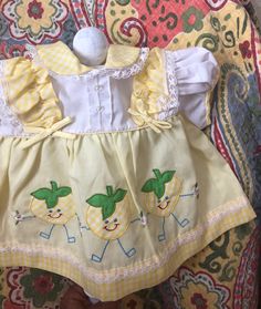 Cute Yellow Dress For Picnic, Sweet Gingham Cotton Dress, White Vintage Cotton Sets, Yellow Cotton Dress For Picnic, Yellow Cotton Retro Vintage Dress, Summer Vintage Dresses For Playtime, Vintage Ruffled Sets For Summer, Vintage Dresses For Summer Playtime, Vintage Ruffle Sets For Summer