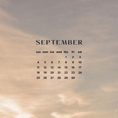 an image of a calendar with the sky in the back ground and clouds above it