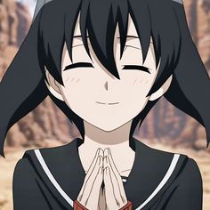 an anime character with black hair and hands folded in front of her face, looking at the camera