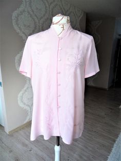 "Vintage 80's Pastel Baby Pink Button Down Short Sleeve Summer Blouse Shirt Women  * Size EU 44 UK 16  US 12  Please check measurements Approx fit S -  L ( Maneken size is M) * 100% Polyester * Light Pink * Shoulder pads * Fastens with 7 buttons * Great vintage condition. Ready to wear.  Measurements: Shoulders - 16.5\" / 42cm Pit to pit - 22\" / 56cm Back Length - 27\" / 69cm Sleeve - 9\"  / 23cm ☆ SHIP WORLDWIDE ☆ I ship from Latvia EU worldwide. Estimated delivery time to: European Union 5 - 7 Business days; USA 2 - 3 weeks; Worldwide 3 - 5 weeks. Thank you for checking in and let me know if you have any questions!  Cheers,  Shop Vintage Commode" Embroidered Short Sleeve Tops For Daywear, Pink Embroidered Button-up Blouse, Pink Button-up Tops With Floral Embroidery, Embroidered Short Sleeve Daywear Shirt, Pink Embroidered Collared Top, Embroidered Short Sleeve Day Shirt, Embroidered Short Sleeve Shirt For Daywear, Embroidered Button-up Daywear Top, Embroidered Button-up Top For Daywear