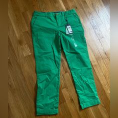 New Pants. Color May Vary Because Of Light But It’s A Vibrant Beautiful Green .Last Pic It’s Kind Of More Accurate Color. Please Ask If You Have Any Questions. Trendy Green Cropped Leg Pants, Trendy Green Cropped Pants, Green Stretch Cropped Leg Bottoms, Tommy Hilfiger Tapered Leg Bottoms With Pockets, Tommy Hilfiger Tapered Leg Pants With Pockets, Green Relaxed Fit Cropped Bottoms, Green Relaxed Fit Chinos For Spring, Casual Green Capris For Work, Fitted Green Cotton Chinos