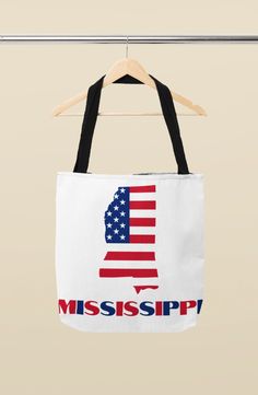 Show off your Southern pride with our American Flag Map of Mississippi Tote Bag, a perfect travel accessory for Ole Miss Rebels football fans, Mississippi State football fans, Southern girls, and SEC college football enthusiasts. This versatile Mississippi tote is ideal for pairing with your college outfit or using as a beach bag. Whether you're headed to an Ole Miss football game, weekend getaway, or simply need a cute Mississippi travel bag, this MS tote is both stylish and functional.

Made for fans of Southern prep and those who love classic Mississippi pot roast, this tote is also a thoughtful addition to college care package ideas. Carry your essentials in true Mississippi style, whether for Mississippi travel, campus life, or college football game day! Mississippi Pot, Mississippi Travel, Principal Gifts, Southern Pride, Package Ideas, Southern Girls, Campus Life, College Care Package, Sustainable Accessories