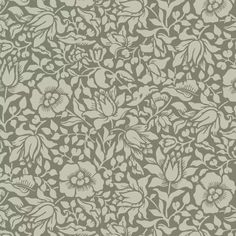 an old wallpaper pattern with flowers and leaves on the side, in shades of grey