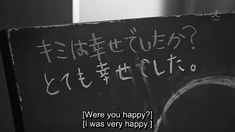 a black and white photo with writing on the back of a sign that says, were you happy? i was very happy