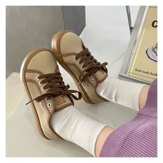 Upper Material: Canvas Insole Material: Fabric Lining Material: Canvas Size Heel to Toe (cm) Heel to Toe (inches) Shoe Size Logo CN 35 21.5~22 8.46~8.66 35/225 CN 36 22.0~22.5 8.66~8.86 36/230 CN 37 22.5~23 8.86~9.06 37/235 CN 38 23.0~23.5 9.06~9.25 38/240 CN 39 23.5~24 9.25~9.45 39/245 CN 40 24.0~24.5 9.45~9.65 40/250 Trendy Round Toe Canvas Shoes With Laces, Trendy Closed Toe Canvas Shoes With Laces, Trendy Canvas Shoes With Round Toe And Laces, Trendy Canvas Shoes With Laces And Closed Toe, Flat Canvas Shoes With Laces For Spring, Spring Flat Canvas Shoes With Laces, Trendy Brown Closed Toe Sneakers, Canvas Shoes With Laces And Round Toe, Fabric Canvas Shoes With Round Toe And Laces