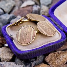 This handsome pair of antique cufflinks each feature two machine engraved discs attached with a gold chain. They are crafted in patinated 14k yellow gold. Formal Etched Bronze Jewelry, Antique Engraved Cufflinks For Formal Wear, Antique Engraved Cufflinks For Formal Occasions, Vintage Yellow Gold Cufflinks For Wedding, Formal Antique Gold Jewelry Stamped 14k, Vintage Engraved Collectible Cufflinks, Etched Rose Gold Jewelry For Formal Occasions, Antique Hallmarked Cufflinks For Wedding, Vintage Yellow Gold Cufflinks With Screw Back