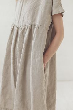 "DETAILS * Oversize linen summer dress * With two side pockets * Loose fit suitable for casual wear * For all body types * Made from soft wash medium weight (185 g) 100 % European linen fabric * Height of the model is 177 cm (5′ 8″) and she is wearing dress in size XS/S and flax linen color. Full dress length laying down on the floor is +/- 101 cm (39.8\"), the sleeve length is +/- 17 cm (6.7\"). * Please choose another color and size on the right * Product number: D42 CARE LABEL * machine wash Casual Beige Dresses With Slip Pockets, Casual Beige Dress With Slip Pockets, Linen Day Dresses With Pockets, Linen Dresses With Pockets For Daywear, Beige Summer Dresses With Side Pockets, Casual Beige Dresses With Side Pockets, Linen Dresses With Side Pockets, Summer Dresses With Pockets In Relaxed Fit, Summer Dresses With Pockets Relaxed Fit