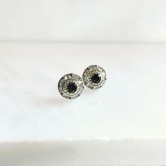 Black diamond post earrings Stunning crystal studs are perfect day or night. The black diamond Swarovski Crystal Chaton is surrounded by slightly lighter but still silver channeled crystals. Each entire setting is vintage (and hard to find) measuring 8mm (.25") in diameter and is adhered to silver tone ear posts. Perfect for adding sparkle to every day or for a special occasion. *The third picture is for sizing not the same shade as listed. Copyright ©, all rights reserved. LoveYourBling® is an Granada, Black Diamond, The Vintage, Swarovski Crystal, Post Earrings, Swarovski Crystals, Diamond Earrings, Silver Tone, Special Occasion