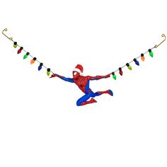 a spiderman hanging from a string with christmas lights on it's legs and arms