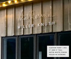 the front of a building with lights on it's side and an advertise for miller knuth