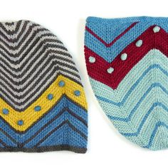 two knitted hats sitting next to each other