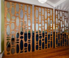 a room divider made out of wood and metal