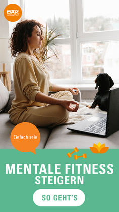 a woman is sitting on the couch with her laptop and dog in front of her