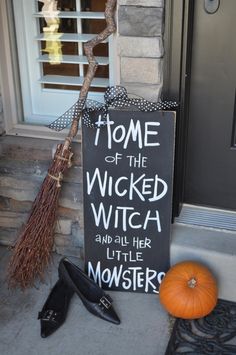 a sign that says home of the wicker witch and all her little monsters