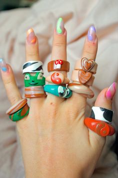 a person with many rings on their fingers