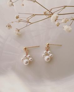 The earrings are simple and cute, featuring a pet's paw shape, made from s925 sterling silver  with 18K gold vermeil. They are versatile and perfect for accessorizing various outfits. Paw dimension: around 8mm. Mother of pearl size: 3mm and 5mm Pearl Flower, Style Earrings, Pearl Size, Pearl Drop, Elegant Jewelry, Minimalist Style, Gold Vermeil, Minimalist Fashion, Mother Of Pearl