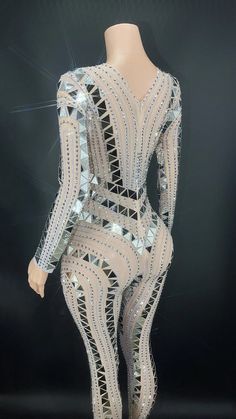 Elevate your stage presence with our exquisite Handmade Sparkly Rhinestones Sequins Jumpsuit! This captivating garment is the perfect choice for women looking to make a glamorous statement at any special occasion. from celebrating birthdays to lighting up the dance floor.Crafted with a blend of high-quality Polyester and Spandex. this jumpsuit ensures both comfort and flexibility. allowing you to move with grace and confidence. Its intricate design is an ode to Folk Dance. showcasing the fusion Glamorous Stretch Bodysuit For Party, Glamorous Stretch Jumpsuits And Rompers For Party, Elegant Club Bodysuit With Rhinestones, Elegant Bodysuit With Rhinestones For Club, Elegant Rhinestone Bodysuit For Club, Elegant Party Bodysuit For Party Season, Glamorous Party Jumpsuits And Rompers With Rhinestones, Glamorous Rhinestone Bodysuit For Night Out, Glamorous Evening Jumpsuits And Rompers With Rhinestones