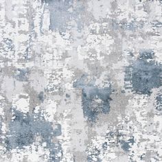 an abstract rug with blue and white colors