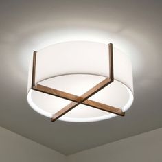 a white ceiling light hanging from the ceiling