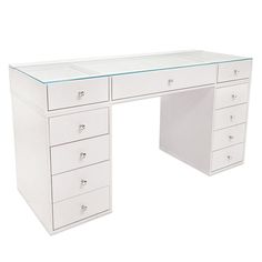 a white desk with drawers and a glass top