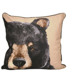 a pillow with a bear's head painted on it