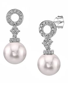 A beautiful pair of 8.5-9.0mm Japanese Akoya cultured pearl earrings with gorgeous 18K gold mountings. Our Akoya pearls come directly from the pearl farms of Japan. These pearl earrings are AA+ quality with Very High luster (please see our Akoya pearl grading section for more information). These pearl earrings comprise of approximately .409 carats of SI-quality diamonds on both mountings and are made of 2.098 grams of the highest quality 18K gold. All pearl earrings are approved by our staff of Pearl Earrings Aesthetic, Tahiti Pearl, Pearl Earrings Designs, Tahitian Pearl Earrings, Akoya Pearl Earrings, Mother Of Pearl Jewelry, Tahitian Black Pearls, Black Pearls, Indian Jewellery Design Earrings