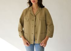 "FREE DOMESTIC SHIPPING Beautiful vintage 60s/70s Francoise Desarbre mod khaki cropped swing coat. Absolutely timeless made from luxurious wool that feels like smooth gabardine. The back is unique with its knit details that gives it a hybrid jacket/sweater esthetic. Finished with a short single notch collar, pleated cropped sleeves, gold royal crown dome buttons and a four pocket front. The two chest pockets are faux and the jacket is fully lined. Perfect throw on and go jacket. Made in France. Vintage Olive Outerwear For Work, Vintage Khaki Spring Blazer, Vintage Khaki Blazer With Lapel Collar, Jacket Design, French Design, Sweater Jacket, Military Jacket, Jackets For Women, Jackets & Coats